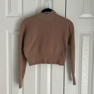 Women’s brown crop sweater in size small.